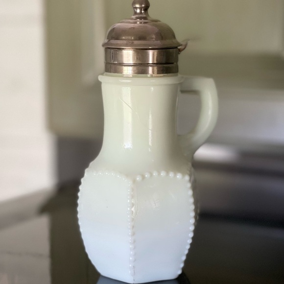 VINTAGE, BEADED, MILK GLASS SYRUP DISPENSER. METAL HINGED LID. 3 1/4”W X 6 3/4”H - Picture 2 of 12
